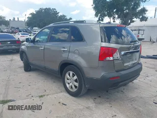 2013 Kia Sorento LX with VIN 5XYKT3A62DG322174, listed as a IAAI auction lot 42647736 with 92,389 mi miles and . Bid and sale history available at DreamBid. Image 3.