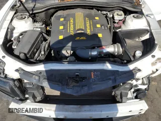 2015 Chevrolet Camaro LT z VIN 2G1FD1E30F9219359, wystawiony jako Copart lot #56681835 z przebiegiem 79 771 mil mil oraz Szkoda całkowita • Salvage title. Historia ofert i sprzedaży dostępna na DreamBid. Obrazek 11.
