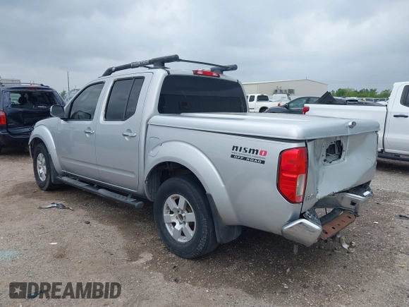 2005 Nissan Frontier LE with VIN 1N6AD07U25C457977, listed as a IAAI auction lot 41906592 with 256,116 mi miles and . Bid and sale history available at DreamBid. Image 3.