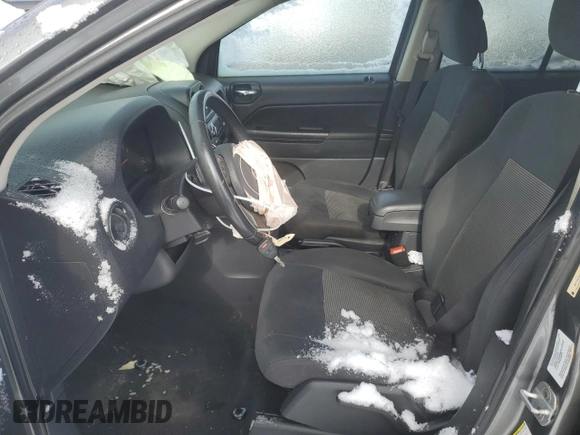 2011 Jeep Compass Latitude with VIN 1J4NT1FA8BD224478, listed as a Copart auction lot 45090345 with 142,051 mi miles and Salvage Title. Bid and sale history available at carsss.com. Image 7.