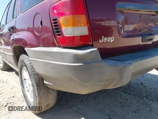 2003 Jeep Grand Cherokee Laredo with VIN 1J4GX48S93C523831, listed as a IAAI auction lot 41852442 with 270,735 mi miles. Bid and sale history available at carsss.com. Image 13.