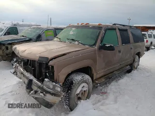 1996 Chevrolet Suburban z VIN 3GNGK26J2TG142460, wystawiony jako Copart lot #87751505 z przebiegiem 153 318 mil mil oraz Szkoda całkowita • Salvage title. Historia ofert i sprzedaży dostępna na DreamBid. Obrazek 1.