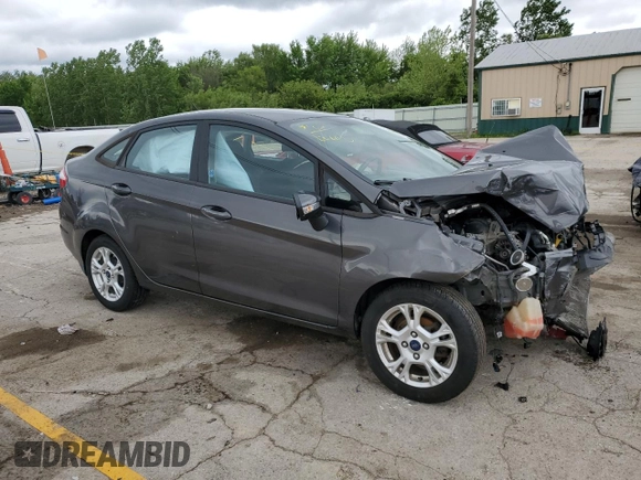 2015 Ford Fiesta SE z VIN 3FADP4BJ8FM150587, wystawiony jako Copart lot #57878275 z przebiegiem Nie podano mil oraz Szkoda całkowita • Salvage title. Historia ofert i sprzedaży dostępna na DreamBid. Obrazek 4.