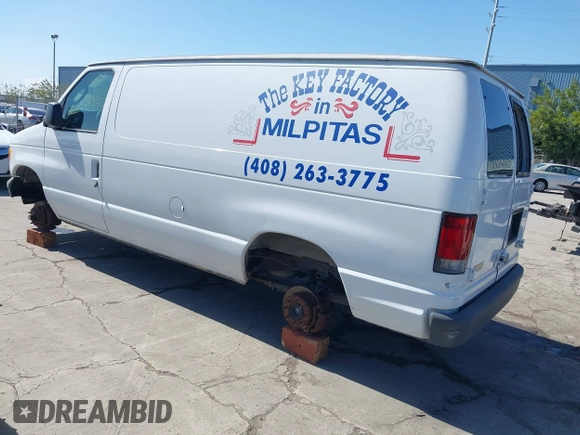 2003 Ford Econoline Cargo with VIN 1FTNE24L23HB81499, listed as a IAAI auction lot 41944485 with 86,629 mi miles and . Bid and sale history available at DreamBid. Image 3.