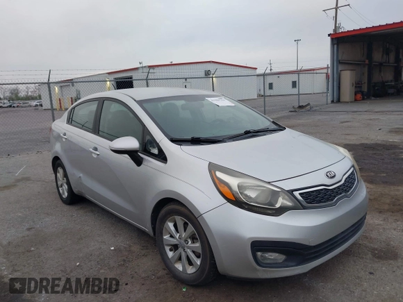 2013 Kia Rio SX with VIN KNADN4A3XD6168179, listed as a IAAI auction lot 41909704 with 79,653 mi miles. Bid and sale history available at carsss.com. Image 1.