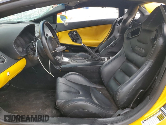 2004 Lamborghini Gallardo z VIN ZHWGU11SX4LA00563, wystawiony jako Copart lot #73732524 z przebiegiem 51 762 mil mil oraz Szkody całkowita. Historia ofert i sprzedaży dostępna na DreamBid. Obrazek 7.