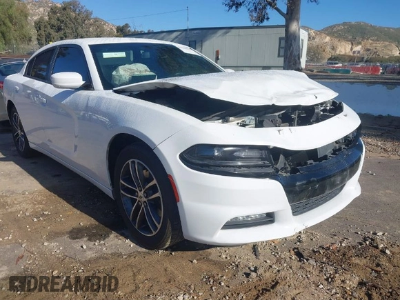 2019 Dodge Charger SXT with VIN 2C3CDXJGXKH533322, listed as a IAAI auction lot 41808838 with 95,877 mi miles and . Bid and sale history available at DreamBid. Image 1.
