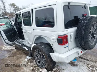 2024 Jeep Wrangler High Altitude z VIN 1C4RJXU66RW174919, wystawiony jako IAAI lot #41563619 z przebiegiem 4 133 mil mil oraz . Historia ofert i sprzedaży dostępna na DreamBid. Obrazek 3.