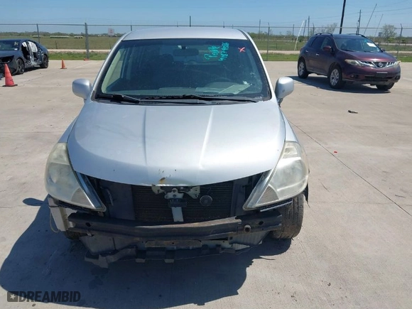 2010 Nissan Versa 1.8 S with VIN 3N1BC1CP7AL433675, listed as a IAAI auction lot 41879386 with 219,794 mi miles. Bid and sale history available at carsss.com. Image 6.