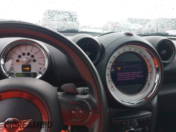 2013 MINI Countryman S ALL4 with VIN WMWZC5C5XDWP31652, listed as a IAAI auction lot 42127716 with 82,601 mi miles and . Bid and sale history available at DreamBid. Image 7.