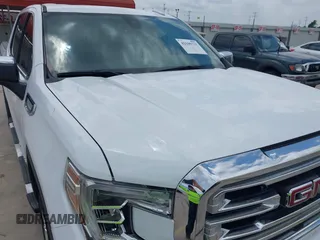 2019 GMC Sierra 1500 SLT z VIN 3GTU9DED4KG197425, wystawiony jako IAAI lot #42105713 z przebiegiem 103 061 mil mil oraz . Historia ofert i sprzedaży dostępna na DreamBid. Obrazek 6.