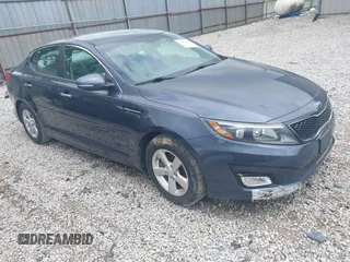 2015 Kia Optima LX z VIN KNAGM4A74F5575202, wystawiony jako IAAI lot #42247021 z przebiegiem 160 023 mil mil oraz . Historia ofert i sprzedaży dostępna na DreamBid. Obrazek 1.