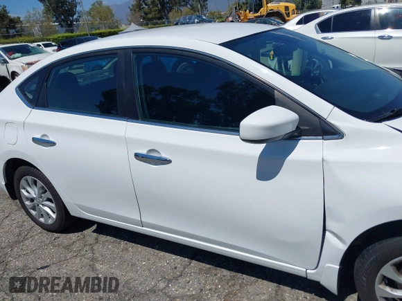 2019 Nissan Sentra SV with VIN 3N1AB7AP8KY296528, listed as a IAAI auction lot 40254265 with 57,196 mi miles and . Bid and sale history available at DreamBid. Image 14.