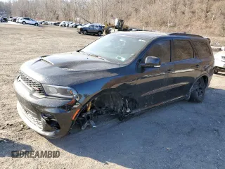 2023 Dodge Durango R/T Plus with VIN 1C4SDJCT3PC584041, listed as a Copart auction lot 42699595 with 20,357 mi miles and Salvage Title. Bid and sale history available at carsss.com. Image 1.