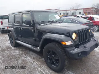 2023 Jeep Wrangler Sport S with VIN 1C4HJXDG8PW653828, listed as a IAAI auction lot 41239974 with 16,076 mi miles and . Bid and sale history available at DreamBid. Image 1.