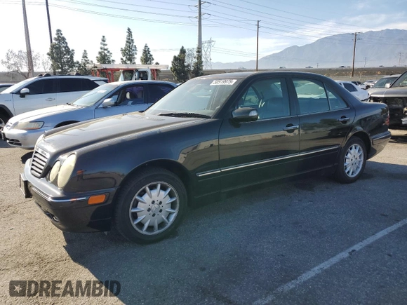 2001 Mercedes-Benz E-Class with VIN WDBJF65J21B365890, listed as a Copart auction lot 50519975 with 110,541 mi miles and Salvage Title. Bid and sale history available at carsss.com. Image 1.