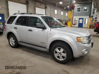 2008 Ford Escape XLT с VIN 1FMCU93128KD51496, выставлен на аукционе Copart как лот 57055865 с пробегом 204 224 миль миль и Списание • Salvage title. История ставок и продаж доступна на DreamBid. Изображение 4.