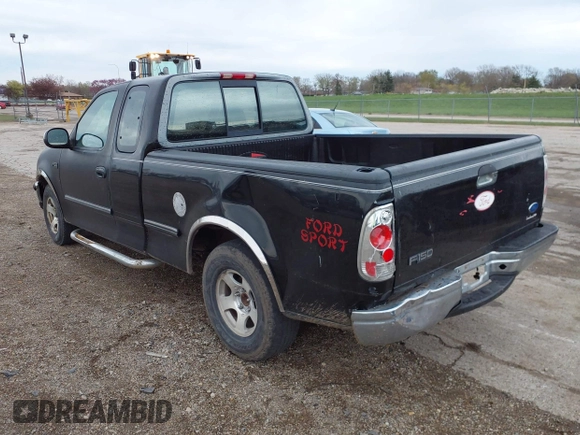 1997 Ford F-150 with VIN 2FTDX1720VCA73590, listed as a IAAI auction lot 41956713 with 128,220 mi miles and . Bid and sale history available at DreamBid. Image 3.