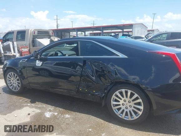 2012 Cadillac CTS Performance z VIN 1G6DJ1E31C0139231, wystawiony jako IAAI lot #42446853 z przebiegiem 102 857 mil mil oraz . Historia ofert i sprzedaży dostępna na DreamBid. Obrazek 14.