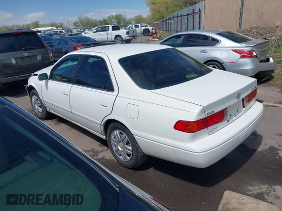 2001 Toyota Camry CE with VIN JT2BG22K210571000, listed as a IAAI auction lot 42061153 with 203,182 mi miles. Bid and sale history available at carsss.com. Image 3.