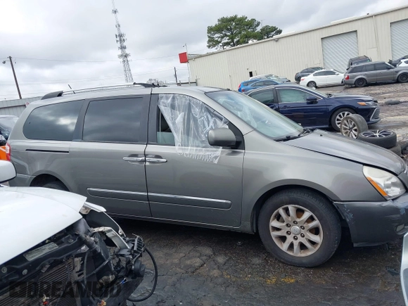 2010 Kia Sedona EX with VIN KNDMH4C33A6342127, listed as a IAAI auction lot 41570657 with 249,395 mi miles. Bid and sale history available at carsss.com. Image 13.