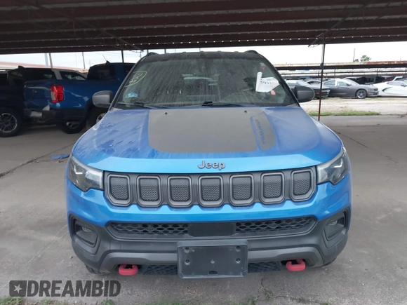 2022 Jeep Compass Trailhawk z VIN 3C4NJDDB6NT162831, wystawiony jako IAAI lot #41950418 z przebiegiem 34 762 mil mil oraz . Historia ofert i sprzedaży dostępna na DreamBid. Obrazek 6.