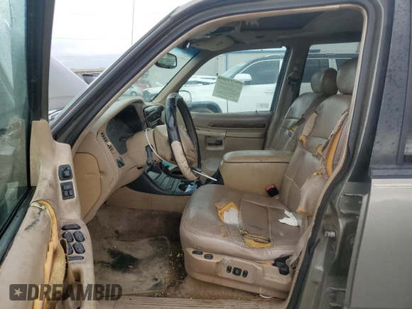 2000 Ford Explorer z VIN 1FMDU65P9YUB42443, wystawiony jako Copart lot #70036074 z przebiegiem 175 479 mil mil oraz Szkoda całkowita • Salvage title. Historia ofert i sprzedaży dostępna na DreamBid. Obrazek 7.