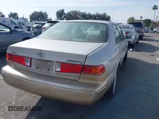 2001 Toyota Camry CE z VIN 4T1BG22K51U083381, wystawiony jako IAAI lot #41482936 z przebiegiem 84 219 mil mil oraz . Historia ofert i sprzedaży dostępna na DreamBid. Obrazek 4.