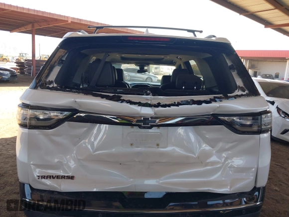 2020 Chevrolet Traverse Premier with VIN 1GNERKKW3LJ117912, listed as a IAAI auction lot 42317330 with 113,576 mi miles and . Bid and sale history available at DreamBid. Image 6.