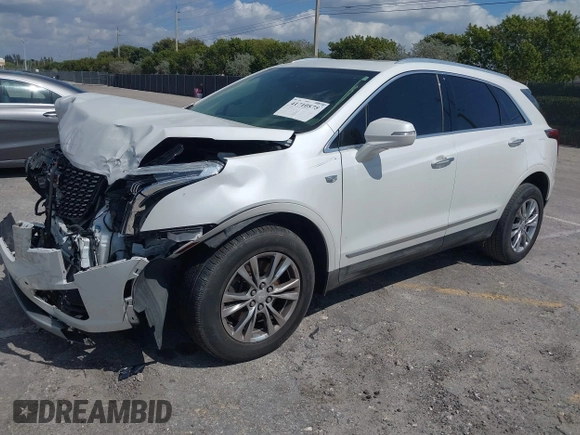 2020 Cadillac XT5 Premium Luxury FWD with VIN 1GYKNCRS7LZ129119, listed as a IAAI auction lot 41710878 with 52,575 mi miles and . Bid and sale history available at carsss.com. Image 17.