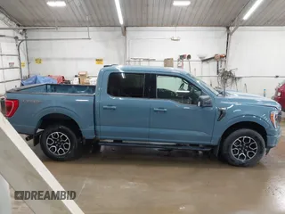 2023 Ford F-150 XL z VIN 1FTFW1E80PKG11643, wystawiony jako IAAI lot #42567764 z przebiegiem 6 448 mil mil oraz . Historia ofert i sprzedaży dostępna na DreamBid. Obrazek 14.