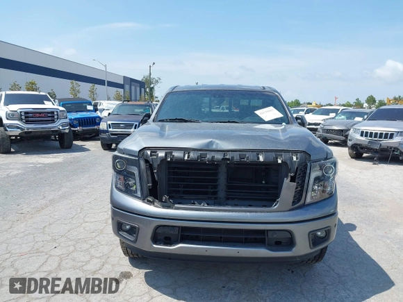 2018 Nissan Titan SV with VIN 1N6AA1E6XJN525640, listed as a IAAI auction lot 42139103 with 88,338 mi miles and . Bid and sale history available at DreamBid. Image 12.
