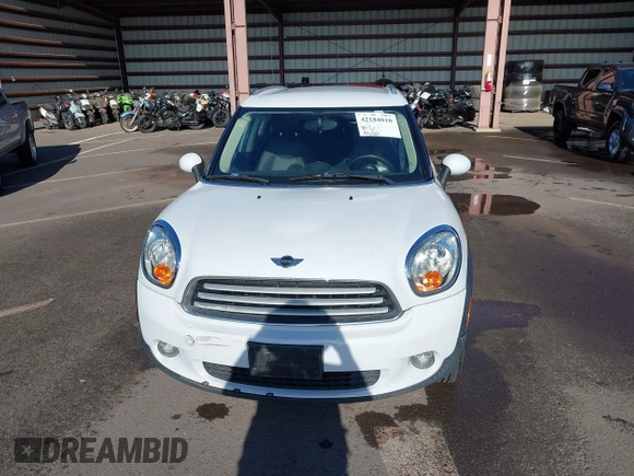 2013 MINI Countryman with VIN WMWZB3C52DWR35806, listed as a IAAI auction lot 42184010 with 93,380 mi miles and . Bid and sale history available at DreamBid. Image 12.