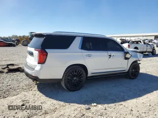 2023 GMC Yukon Denali Ultimate with VIN 1GKS2EKL0PR132029, listed as a Copart auction lot 77234034 with 58,071 mi miles and Salvage Title. Bid and sale history available at carsss.com. Image 3.