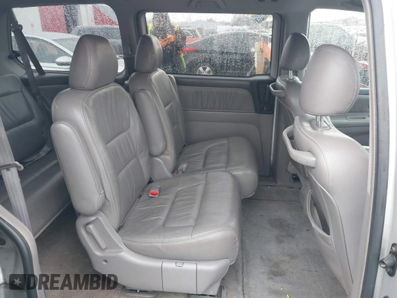 2004 Honda Odyssey EX-L with VIN 5FNRL18934B016420, listed as a IAAI auction lot 41473237 with 188,659 mi miles and . Bid and sale history available at DreamBid. Image 8.