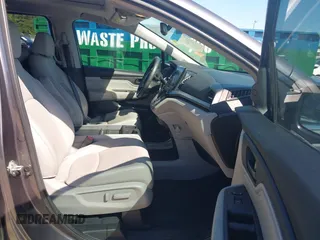 2020 Honda Odyssey Touring z VIN 5FNRL6H84LB001511, wystawiony jako IAAI lot #42194828 z przebiegiem 218 269 mil mil oraz . Historia ofert i sprzedaży dostępna na DreamBid. Obrazek 5.