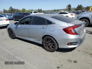 2020 Honda Civic LX z VIN 19XFC2F6XLE209685, wystawiony jako Copart lot #59595335 z przebiegiem Nie podano mil oraz Szkoda całkowita • Salvage title. Historia ofert i sprzedaży dostępna na DreamBid. Obrazek 2.