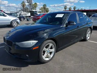 2013 BMW 3 Series 328i with VIN WBA3C1G53DNR44733, listed as a IAAI auction lot 41690337 with 129,704 mi miles. Bid and sale history available at carsss.com. Image 2.