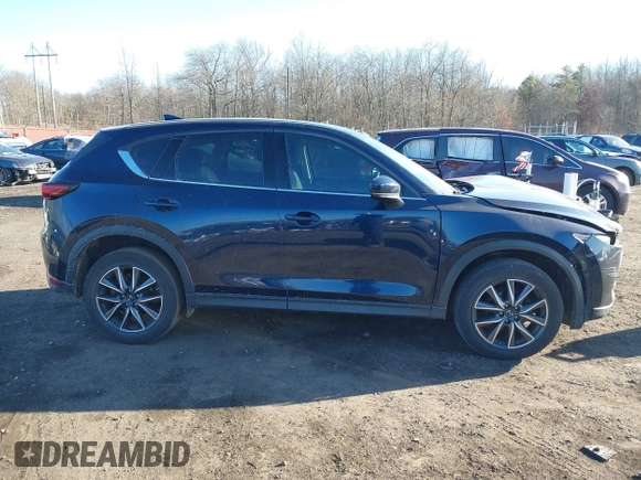2017 Mazda CX-5 Grand Touring with VIN JM3KFBDL0H0104806, listed as a IAAI auction lot 41621964 with 60,728 mi miles. Bid and sale history available at carsss.com. Image 14.