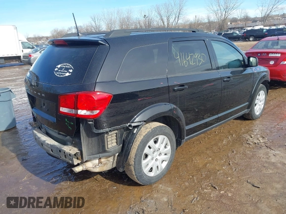 2019 Dodge Journey SE with VIN 3C4PDCBB1KT694545, listed as a IAAI auction lot 41642930 with 103,935 mi miles and . Bid and sale history available at DreamBid. Image 4.