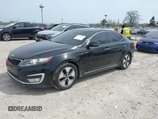 2013 Kia Optima Hybrid EX with VIN KNAGM4AD5D5055464, listed as a IAAI auction lot 42114901 with 140,652 mi miles. Bid and sale history available at carsss.com. Image 2.