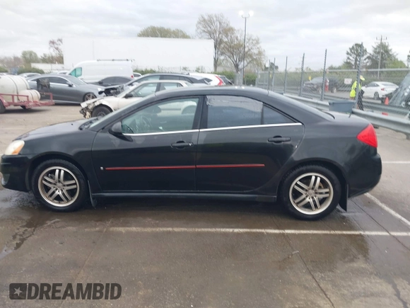 2009 Pontiac G6 1SB with VIN 1G2ZJ57B594263412, listed as a IAAI auction lot 41844953 with 234,057 mi miles and . Bid and sale history available at DreamBid. Image 14.