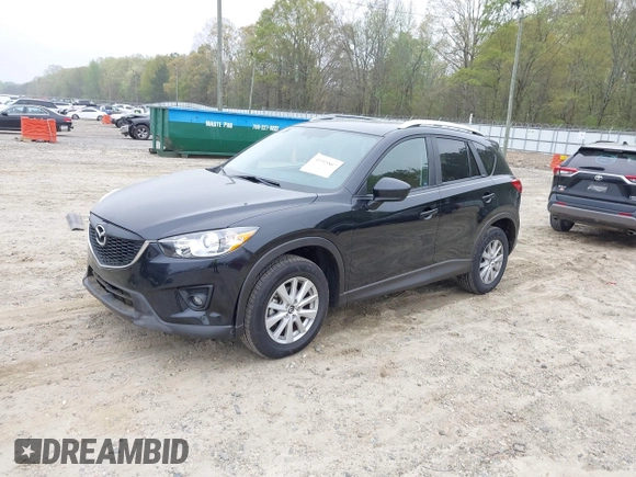 2014 Mazda CX-5 Touring with VIN JM3KE2CY7E0341658, listed as a IAAI auction lot 41915807 with 99,287 mi miles. Bid and sale history available at carsss.com. Image 18.
