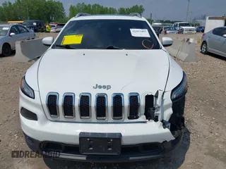 2016 Jeep Cherokee Latitude with VIN 1C4PJMCB8GW148470, listed as a IAAI auction lot 42415483 with 146,427 mi miles and . Bid and sale history available at DreamBid. Image 13.