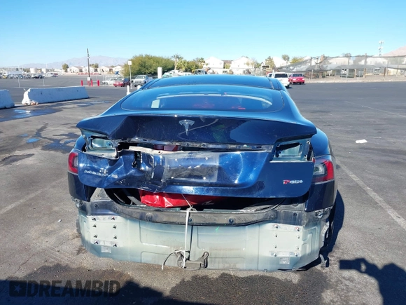 2014 Tesla Model S 60 with VIN 5YJSA1H14EFP57209, listed as a IAAI auction lot 41305157 with 141,364 mi miles and . Bid and sale history available at DreamBid. Image 17.