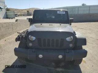 2014 Jeep Wrangler Unlimited Sport with VIN 1C4BJWDG8EL207287, listed as a Copart auction lot 49522335 with 67,472 mi miles and Salvage Title. Bid and sale history available at carsss.com. Image 5.