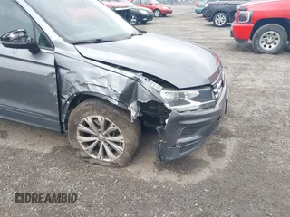 2019 Volkswagen Tiguan S with VIN 3VV0B7AX1KM046808, listed as a IAAI auction lot 41911225 with 62,972 mi miles and . Bid and sale history available at DreamBid. Image 6.