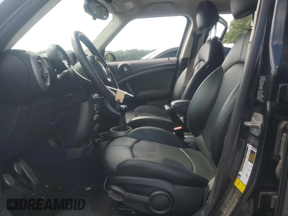 2012 MINI Countryman S with VIN WMWZC3C50CWM28043, listed as a Copart auction lot 64701505 with 166,819 mi miles and Salvage title. Bid and sale history available at DreamBid. Image 7.