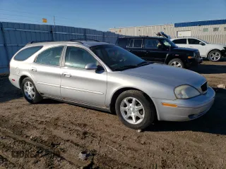 2000 Mercury Sable z VIN 1MEFM58U6YA612226, wystawiony jako Copart lot #80107064 z przebiegiem 186 885 mil mil oraz Czysty tytuł • Clean title. Historia ofert i sprzedaży dostępna na DreamBid. Obrazek 4.