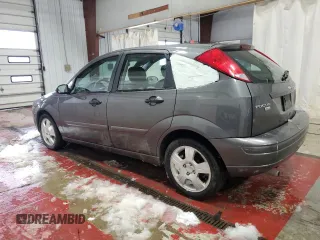 2005 Ford Focus S z VIN 3FAFP37N25R133770, wystawiony jako Copart lot #54927585 z przebiegiem 179 959 mil mil oraz Nie do naprawy. Historia ofert i sprzedaży dostępna na DreamBid. Obrazek 2.